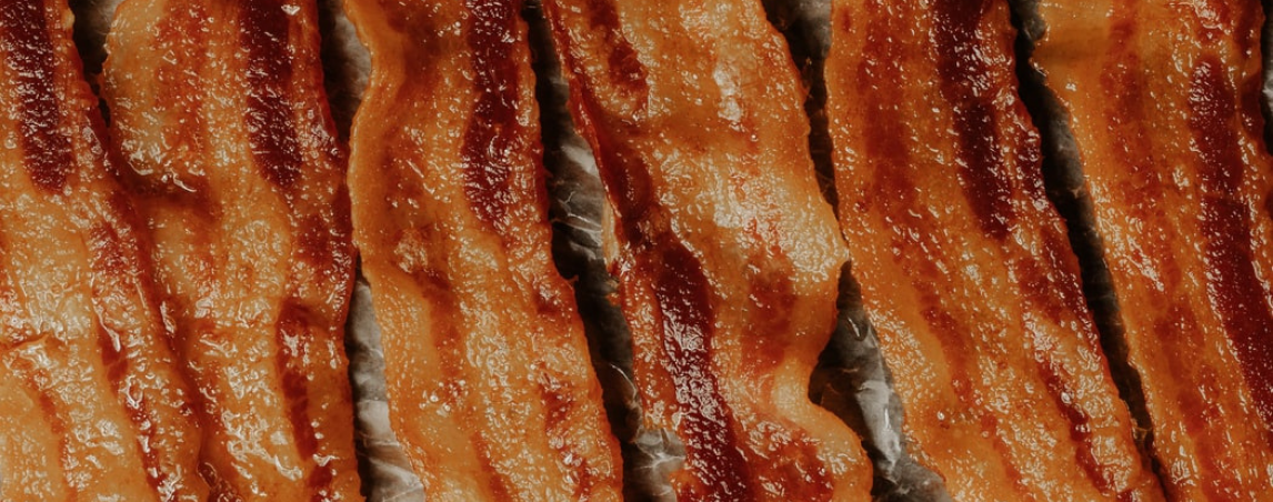 Turkey Bacon Topped Hot Dog - Jamie Geller